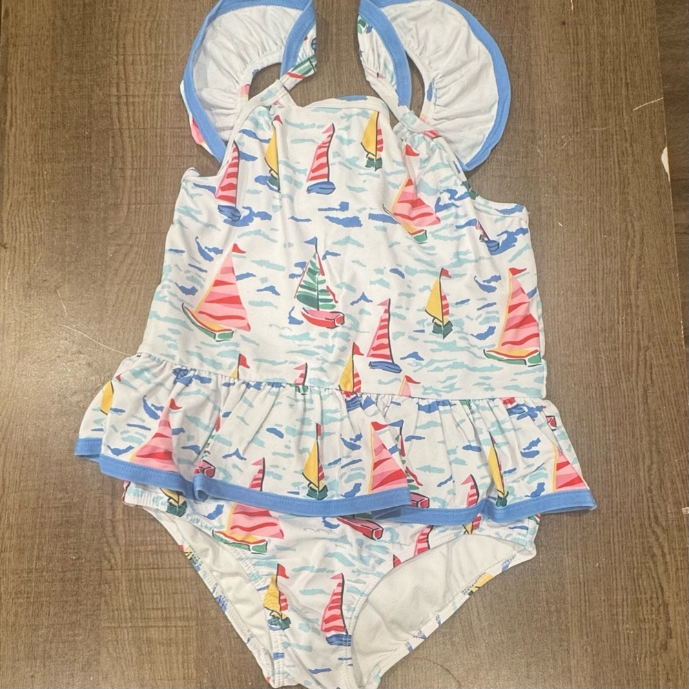 White One-Piece Swimsuit with Multicolor Sailboats and Blue Trim